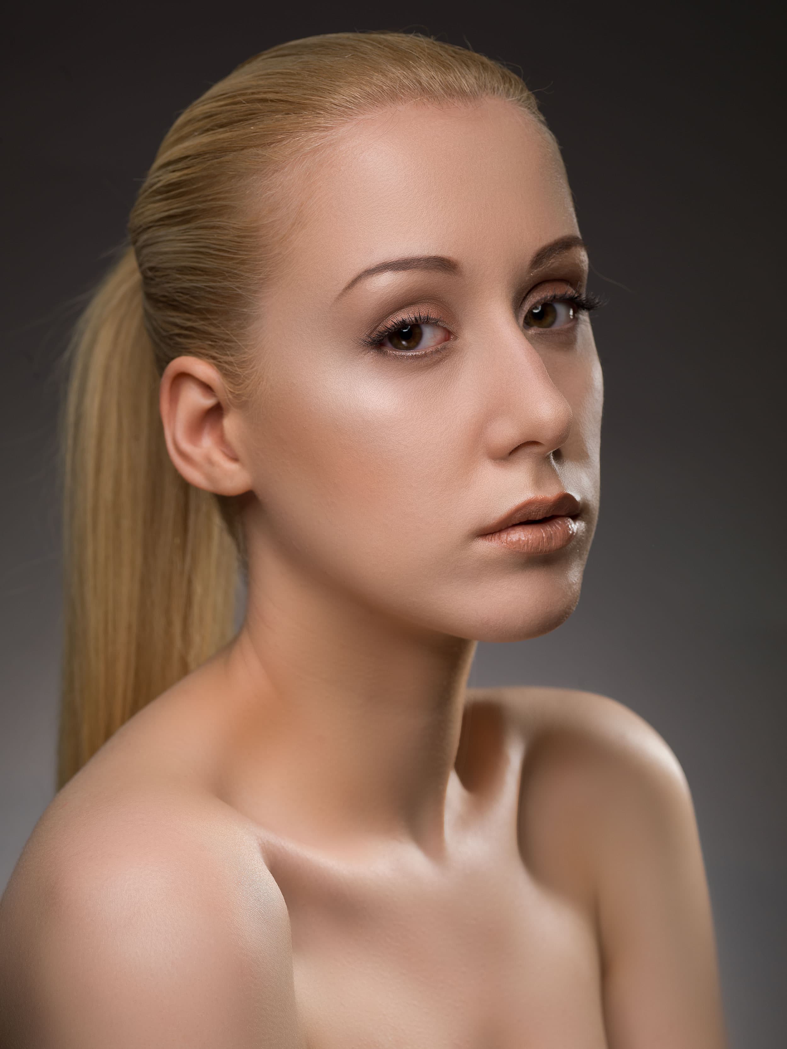 After — blonde model retouched with Olune Skin, luminous and even skintone